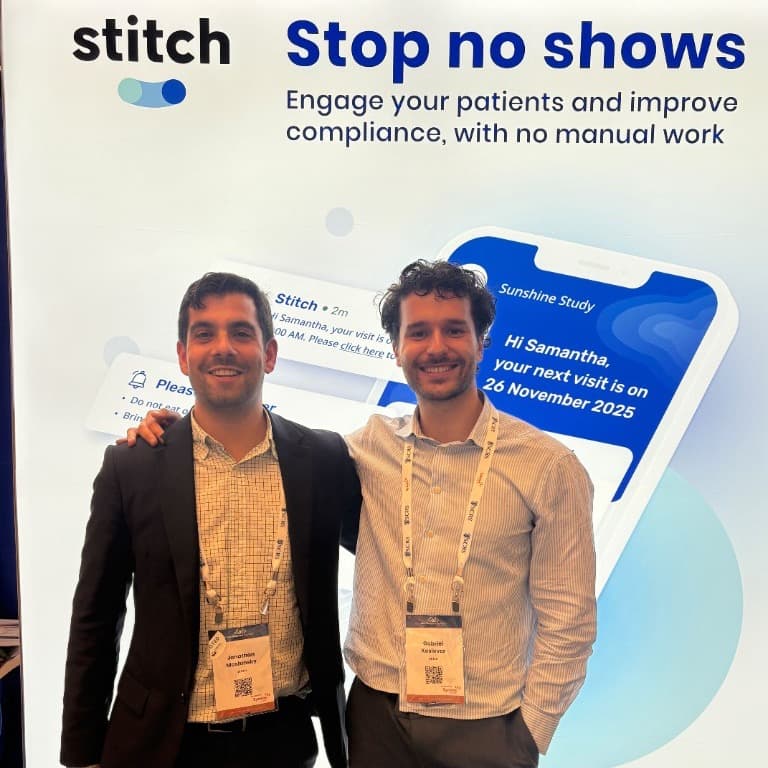 Stitch co-founders at the Stitch conference booth